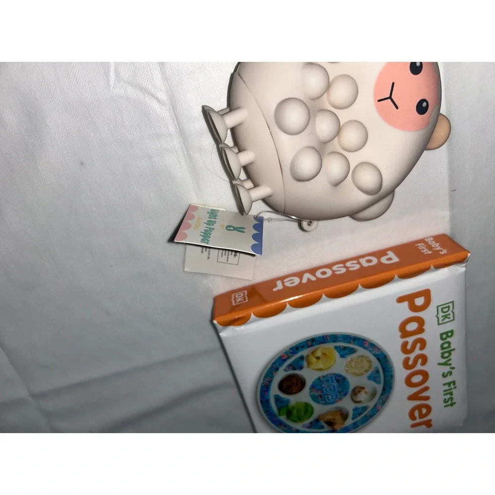 DK Baby's First Passover Board Book and Sheep Light Up Popper Silicone‎ Toy Set